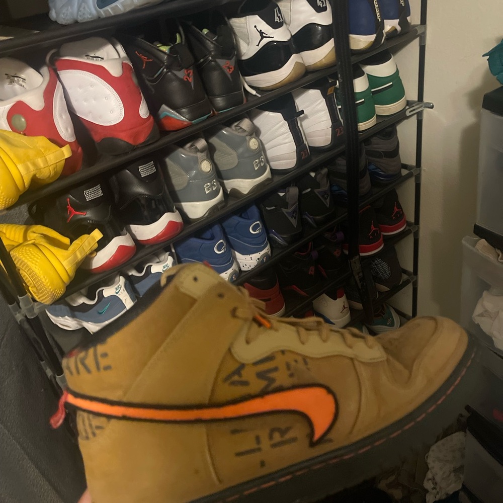 Nike Brown High-Top Sneakers with Orange Swoosh